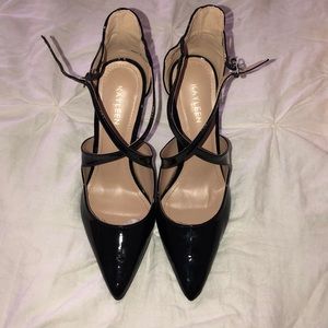 Black patent leather cross pumps
